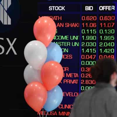 Aussie shares hit record high as rate-cut hopes grow