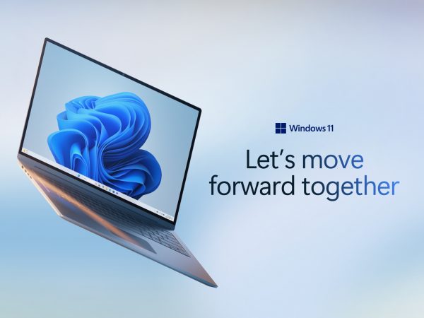 Laptop running Windows 11 along with the words Let's move forward together