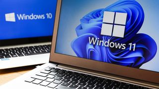 Windows 11 and Windows 10 logos pictured on laptop screens.