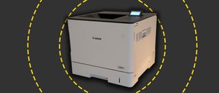 The Canon i-SENSYS LBP732Cdw printer on the ITPro background