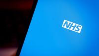 NHS logo displayed on a smartphone screen in white lettering on a blue background.