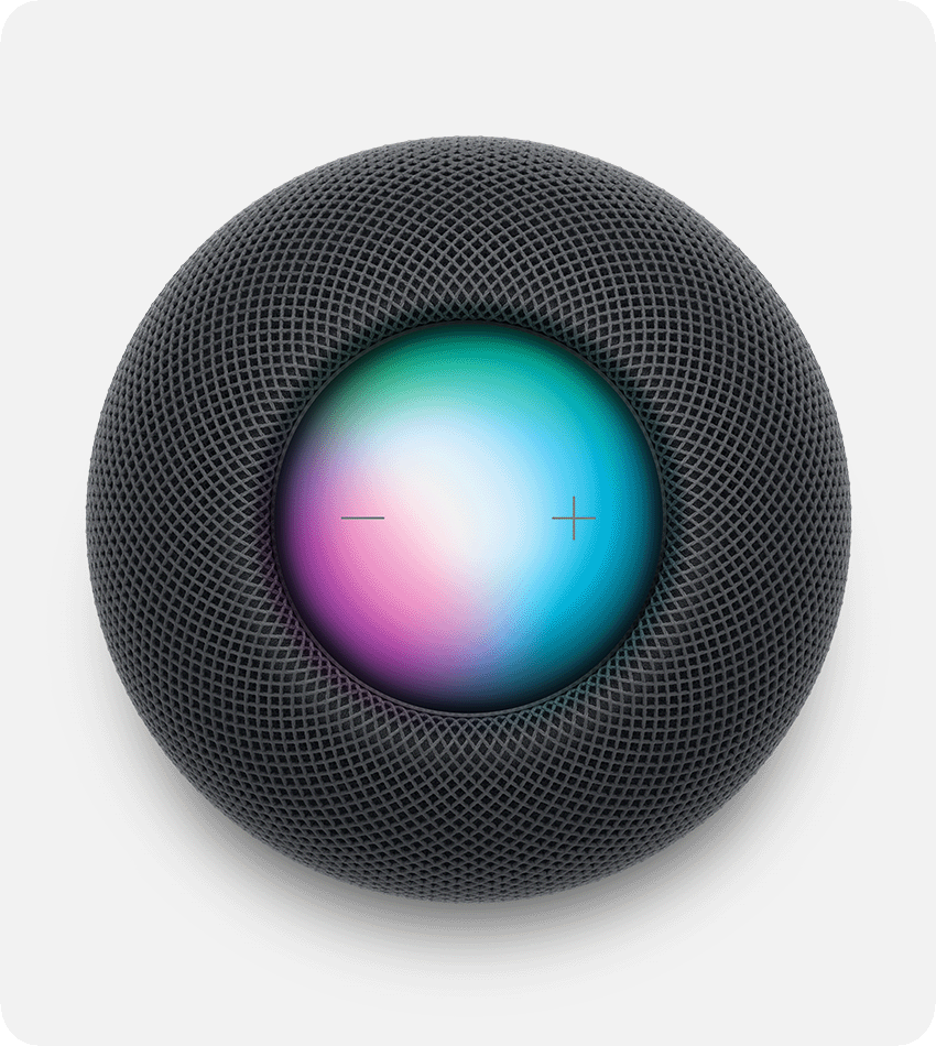 Vue du dessus d'un HomePod avec lumières multicolores allumées