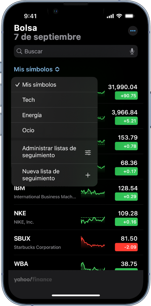 Una lista de seguimiento mostrando varias acciones. Cada acción en la lista muestra, de izquierda a derecha, el símbolo y nombre de la acción, una gráfica de rendimiento, el precio la acción y los cambios en su precio. En la parte superior de la pantalla, se selecciona la lista de seguimiento Mis símbolos, donde están disponibles las siguientes listas de seguimiento y opciones: Tecnología, Energía, Entretenimiento, Gestionar listas de seguimiento y Nueva lista de seguimiento.