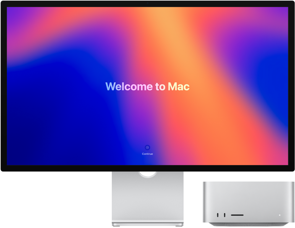 A Studio Display and a Mac Studio side by side with “Welcome to Mac” on the screen.