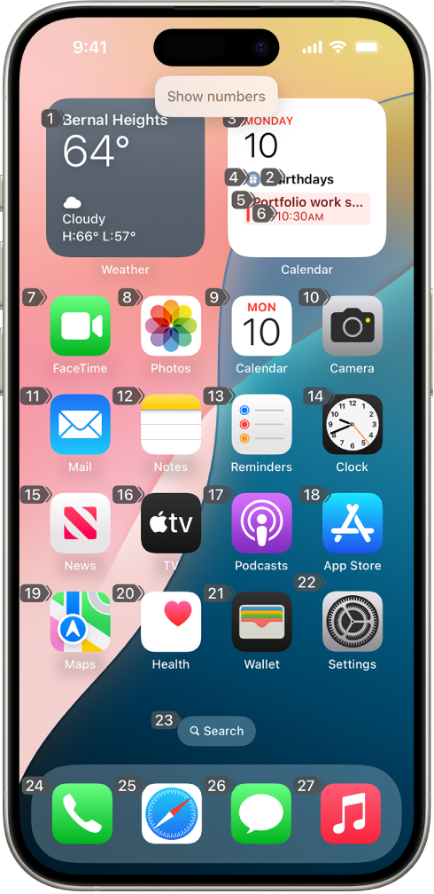 An iPhone showing a number next to each item on the Home Screen. At the top of the screen, the Voice Control command “Show numbers” is displayed.