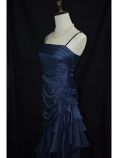 This exquisite dark blue prom gown features a vintage floral design that exudes timeless elegance. The asymmetrical hemline adds a modern twist, creating a captivating silhouette that will make you stand out at any event. Designed with delicate spaghetti straps, this dress is perfect for those special adult milestone celebrations.  Garment Size   	 		 			Size 			XS 			S 			M 			L 			XL 		 		 			Bust 			78 			82 			86 			90 			94 		 		 			Waist 			60 			64 			68 			72 			76 		 		 			Hips 			84 Navy Blue Dress Homecoming, Midnight Blue Homecoming Dress, 2000 Dress Early 2000s, Prom Dresses High School, Teal Dress Formal, Dark Blue Dress Formal, Dark Blue Long Dress, Dark Blue Clothes, Floral Elegant Dress