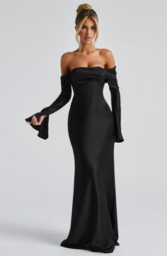 Be obsessed with Selene, an elegant, bias cut design made from our luxe textured satin which skims beautifully over the figure. With a twist panel bardot neckline and long, flared sleeves, this maxi style is finished with waist tie to the side seams. Pair with tonal heels and soft waves. 



Colour: Black.

Premium textured satin.

Fully lined.

Bardot neckline with twisted panel.

Bias cut design.

Long sleeves with slighted flared split cuffs.

Waist tie attached at side seams.

Skims over the Black Classy Gown, Black Gala Dress Long, Black Bridesmaid Dresses Long Sleeve, Black Tie Formal Dress, Black Tie Wedding Guest Attire, Black Dresses Long Sleeve, Long Sleeve Formal Dresses, Black Tie Wedding Attire, Black Dress Wedding