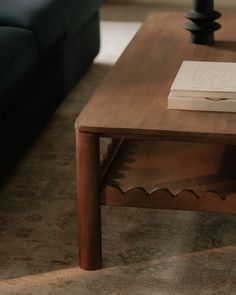 a coffee table with a book on it