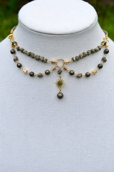 One of a kind pyrite healing choker necklace with shiny gold celestial details. Made with 14k gold elements that will last. Message me for custom sizing, we are size inclusive! Witchy Beaded Jewelry, Simple Choker Necklace Designs, Witchy Necklaces, Fairy Choker, Necklace Making Ideas, Beaded Moon, Diy Choker Necklace, Beaded Necklace Ideas, Ethereal Jewelry