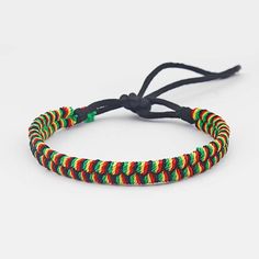 Introducing the Rasta Surfer Bracelet: Embrace the Surf and Reggae Lifestyle Combine your love for surfing and reggae music with the stylish Rasta Surfer Bracelet. Made from high-quality cotton, this ethnic-inspired accessory is a must-have for any passionate sea lover. Whether you're hitting the waves or vibing to the rhythm of reggae, this bracelet is the perfect way to showcase your affinity for the sea and surf culture. Features of the Rasta Surfer Bracelet based on the Product Content Made Bracelets Hippie, Dolphin Bracelet, Sea Turtle Bracelet, Fish Hook Bracelet, Cotton Bracelet, Fish Hook Necklace, Whale Necklace, Shark Necklace, Sea Turtle Necklace