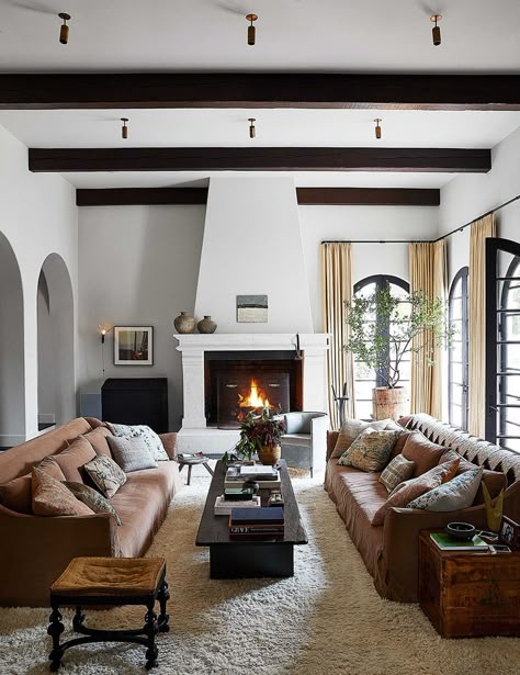 After designing for film director John Schlessinger, his work caught the attention of a plethora of celebrity clients, including Elizabeth Taylor. Waldo’s design has been a fixture on Almont Drive for over 28 years. #waldofernandez #waldoworks #interiordesign #homedesign #losangeles Large Open Entry Way Into Living Room, Family Room With Beams, Kendall Jenner House, Jenner House, New York Loft, Los Angeles Homes, Modern Organic, Chapter 3, Living Room Inspo