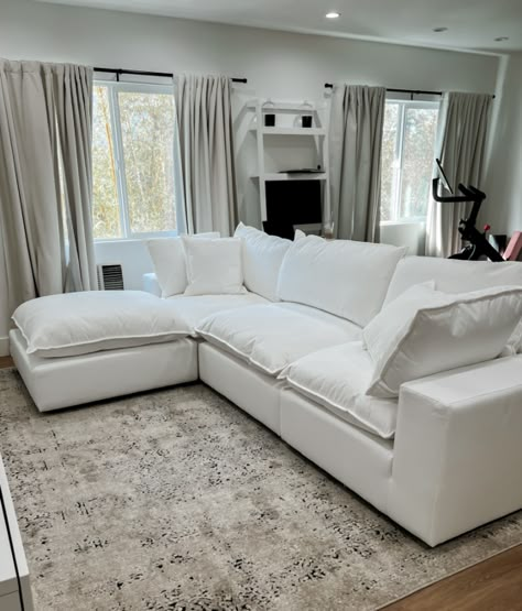 I found the best and most afforable cloud couch dupe. Find out where I got it and how I plan to keep it clean. My couch was finally delivered 6 months after I ordered it but I have to say, it was well worth the wait. Continue reading The Most Affordable Cloud Couch Dupe at The Luxe Minimalist. Throw Pillows For Cloud Couch, Cali Modular Sectional, Comfy Fluffy Couch, White Leather Sectional Sofa, 25 Home Couch, Down Couches Sofas, Soft Couches Living Room, White Cloud Sofa, Amazon Cloud Couch