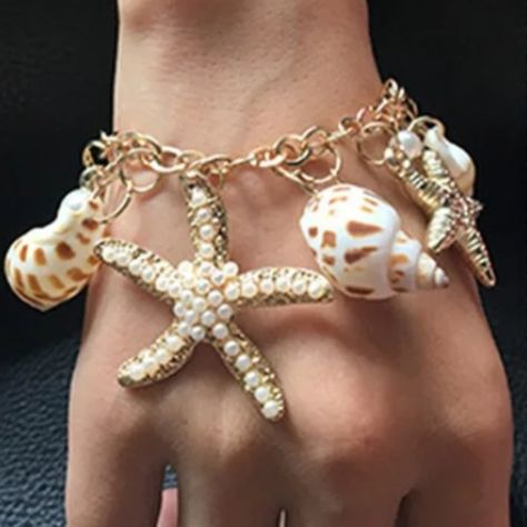 New Boutique, No Tags Anthropologie Seashell Starfish Charm Beach Bracelet This Stunning Seashell Bracelet Is Your Perfect Summer Companion. Adorned With Delicate Pearls And Shimmering Seashells, It Evokes The Feeling Of Sun-Kissed Beaches And Ocean Waves. Perfect For Your Next Vacation Or A Touch Of Seaside Chic In Your Everyday Style. Measurements 18.5cm Seashell Bracelet, Beach Bracelet, Beach Bracelets, Anthropologie Jewelry, Shell Bracelet, Sun Kissed, Ocean Waves, Perfect Summer, Womens Jewelry Bracelets