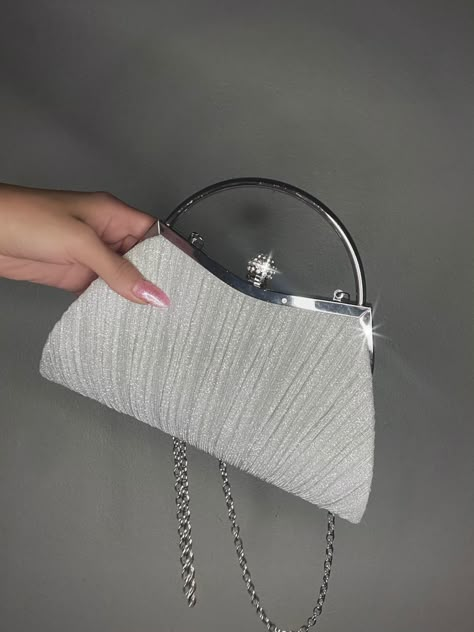 a hand holding a silver sparkly clutch with a metal short handle and long silver thin chain strap White Prom Purse, Silver Prom Purse, Silver Bags For Prom, Silver Prom Bag, Oath Taking Outfit, Formal Bags, Prom Bags, Prom 2k23, White Clutch Purse