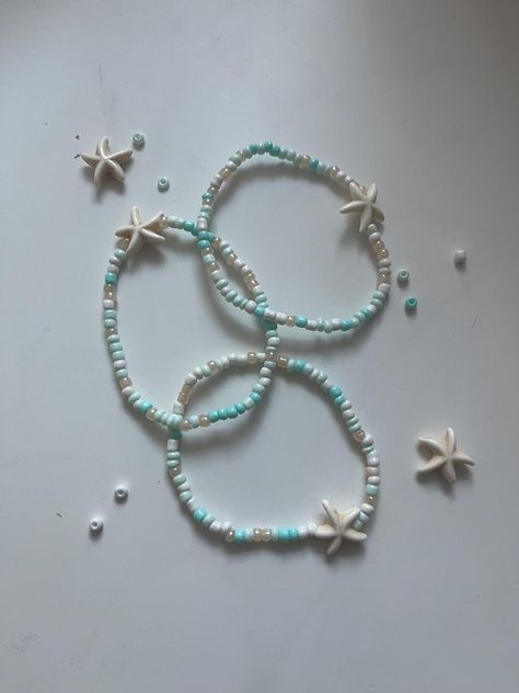 Embrace the beauty of the sea with this handmade ocean-themed bracelet! Featuring costal-colored seed beads and a delicate starfish charm, this bracelet is perfect for anyone who loves the sea. Each piece is handcrafted to order, insuring a unique and personal touch. Whether you're looking for the perfect summer accessory or a thoughtful gift for a beach lover, this bracelet captures the essence of seaside serenity. Lightweight, stylish, and easy to wear- bring a little bit of the beach with you wherever you go! Coastal Colors, Ocean Vibes, Beach Lover, Summer Accessories, Beach Themes, Perfect Summer, Starfish, Seed Beads, The Ocean