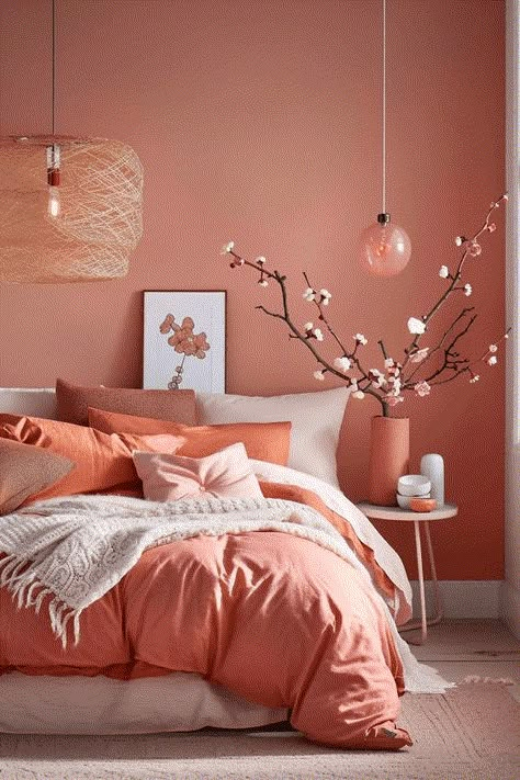 The Best Feng Shui Bedroom Colors Ideas Trending In 2024! Blush And Burnt Orange Bedroom, Colorful Country Bedroom, Peach Guest Bedroom, Vibrant Bedroom Ideas Color Inspiration, Coral Color Bedroom Ideas, Sleeping Room Colors, Light Coral Bedroom, Coral Boho Bedroom, Peach Wall Bedroom