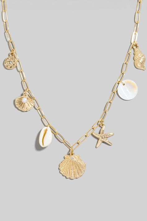 This chain necklace displays a fashionable mixed sea life charms style. Redefine your look effortlessly with this standout, on-trend piece. PUKA SHELL, CLAM, PEARL, CONCH, STARFISH 16 Inch length, 3 inch extension Pearl Necklace Mermaid, Beachy Necklaces Boho, Boho Beach Jewelry, Cute Shell Necklaces, Sea Shell Clothes, Cute Cheap Jewelry, Ocean Charm Necklace, Sea Themed Necklace, Summer Beach Necklaces