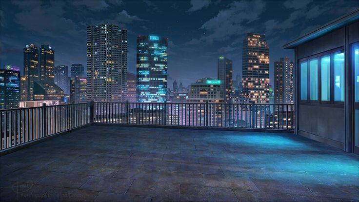 an empty balcony with city lights in the background