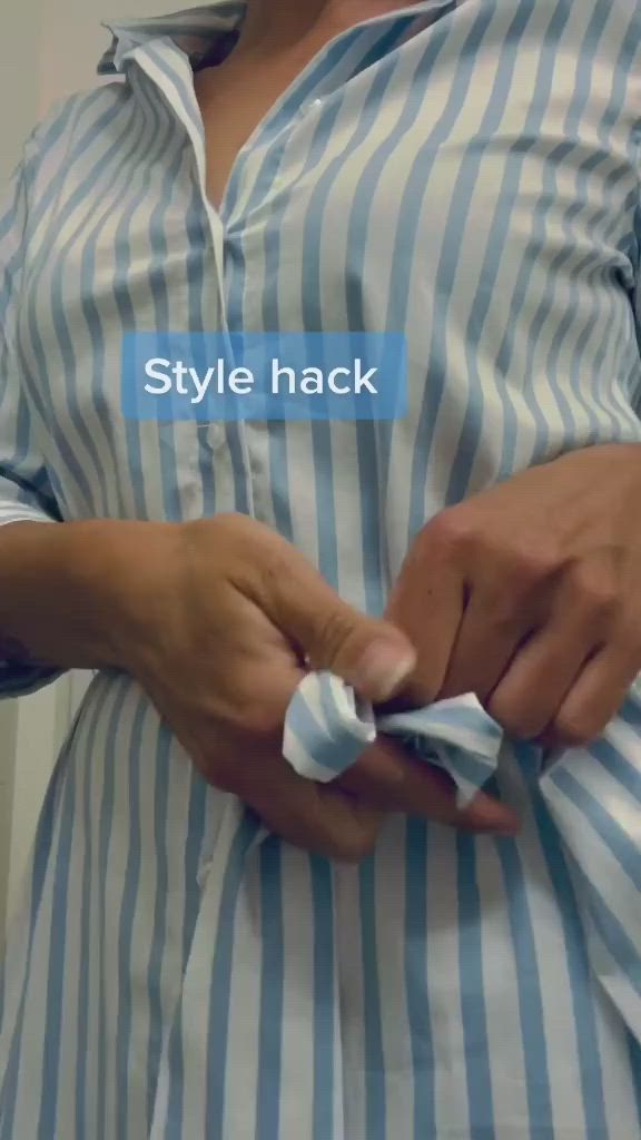 This may contain: a woman wearing a blue and white striped dress with the words style hack written on it