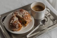 Kaboompics - Morning Indulgence - Donut and Coffee on Silver Tray - Pączek - Pączki