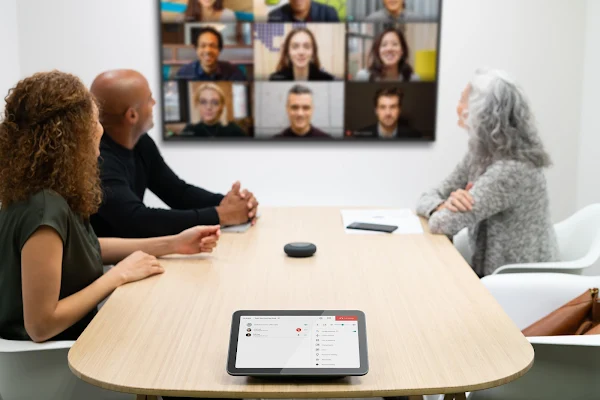 A team using Google Meet hardware for video conferencing 