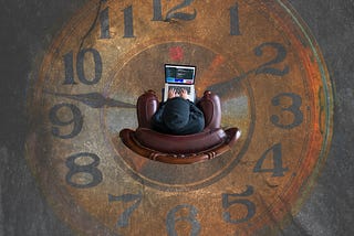 Person writing on a laptop on a chair. The floor is painted as a clock.