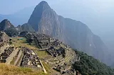 a landscape photo of the Inka ruins at Machu Picchu