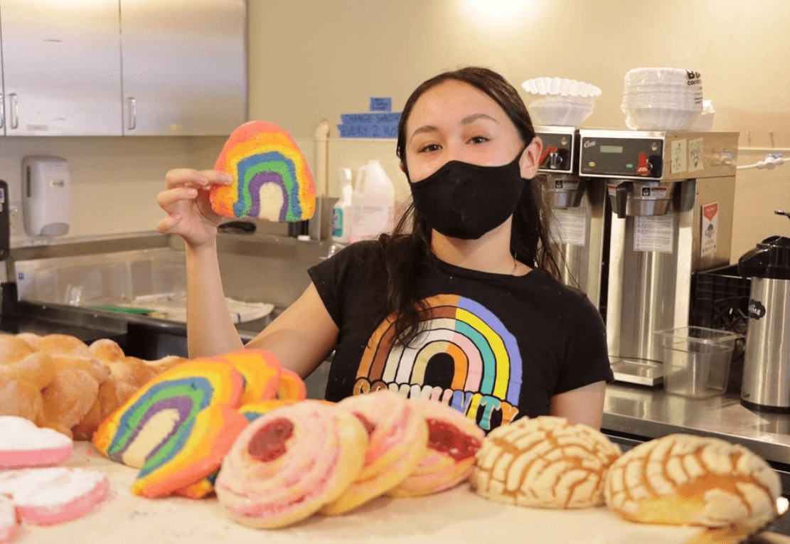 A student working at Cowell Coffee Shop