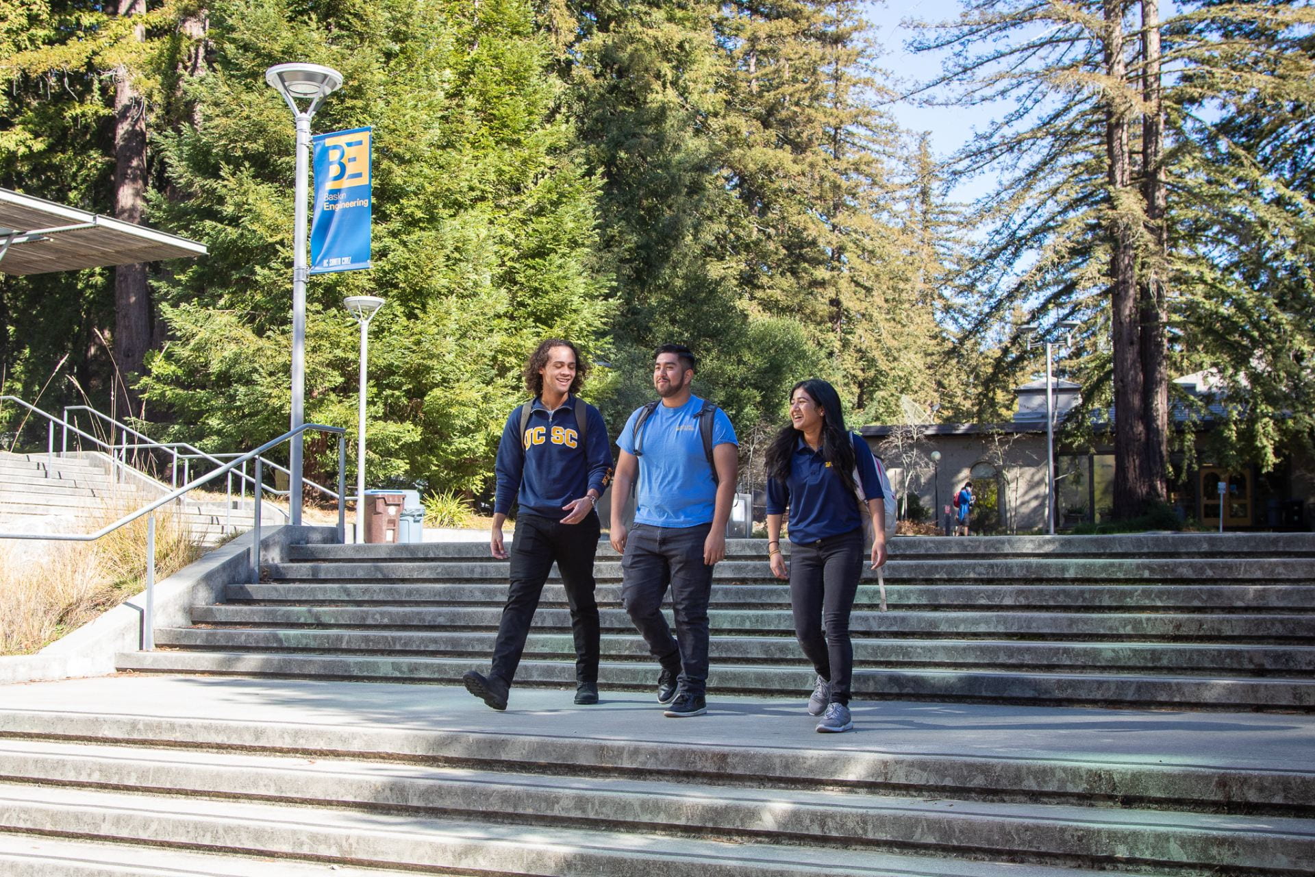 Students walking and talking on campus