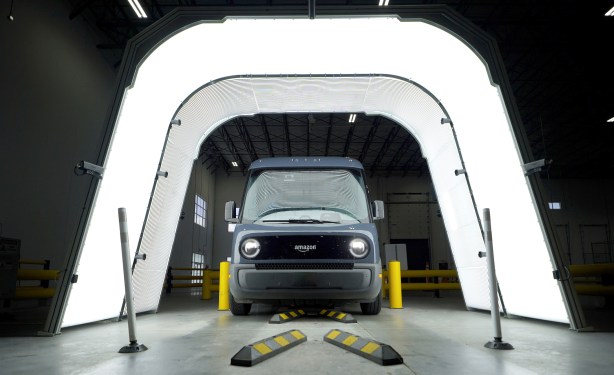 A Rivian-built Amazon delivery van going through UVEye's inspection system