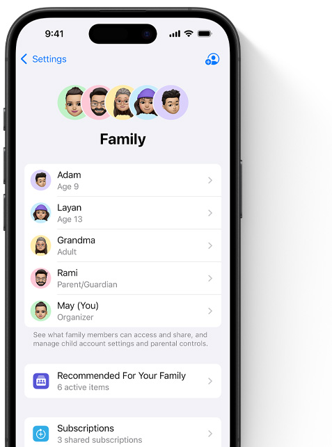 iPhone screen showing the Family page in Settings, Memojis of individual family members, each set against its own colorful circle, arrayed at the top, same Memojis in a list beneath them showing all members of the Family Sharing group