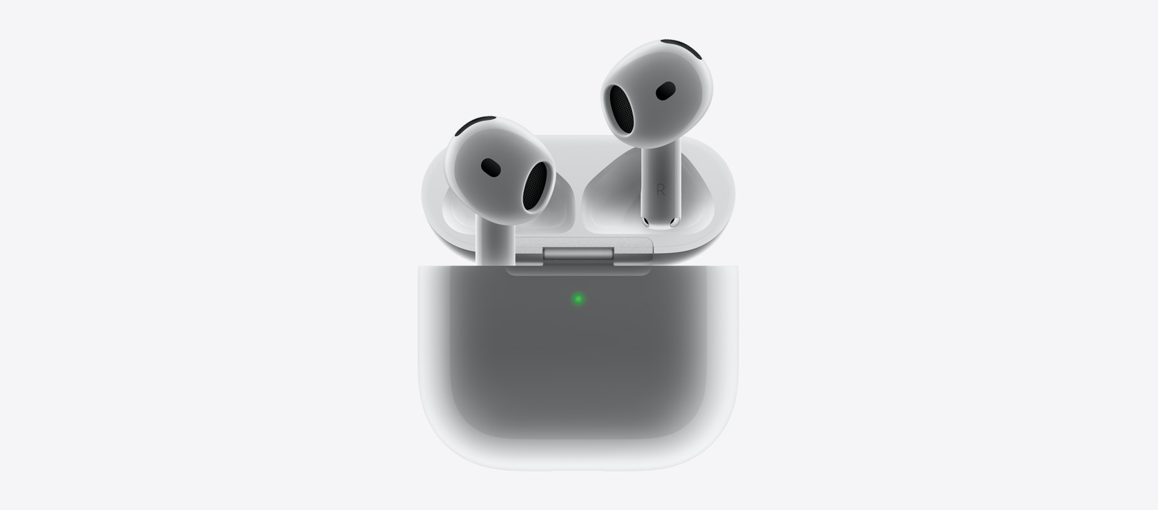 AirPods 4, които влизат в кутията зарядно.