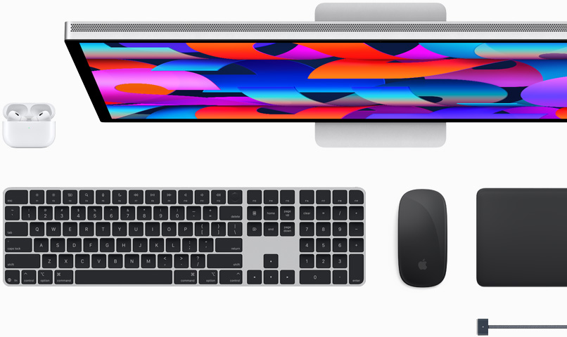 Mac accessories: AirPods, Studio Display, Magic Keyboard, Magic Mouse, Magic Trackpad, MagSafe charge cable in Midnight color