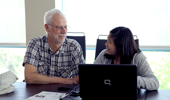 A computing educator works with a student who has a hearing impairment